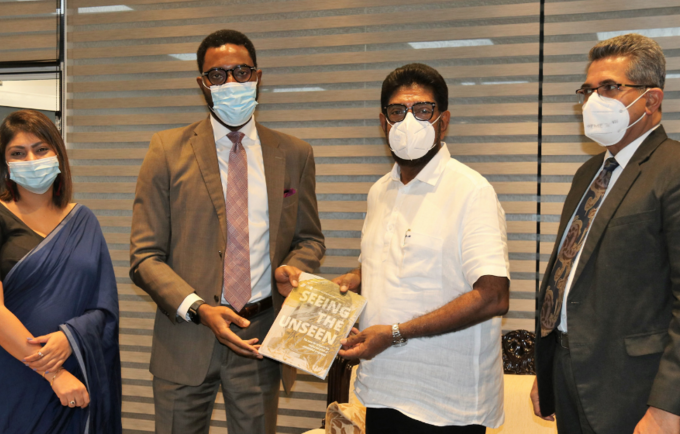 UNFPA presents its flagship publication to the Hon. Minister of Health 